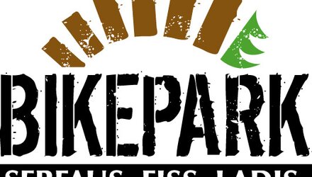 Logo des Bikeparks Serfaus Fiss Ladis mit stilisiertem Bergmotiv.